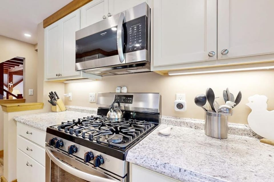 Kitchen or kitchenette, dishwasher, stove, toaster, kitchen