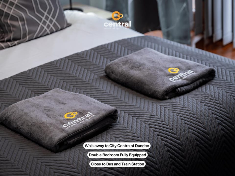 Bed, Photo of the whole room, Bedroom, Text overlay, towels