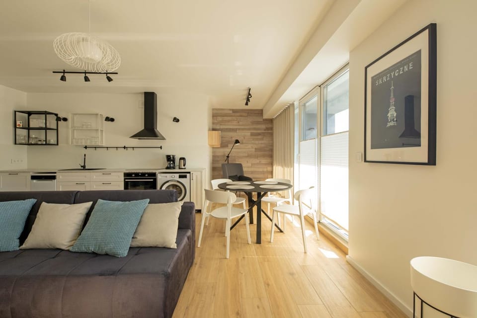 Kitchen or kitchenette, Living room, Seating area, Dining area