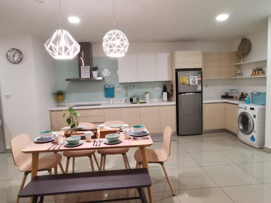 Kitchen or kitchenette, Seating area, Dining area, oven, stove, washing machine, dryer