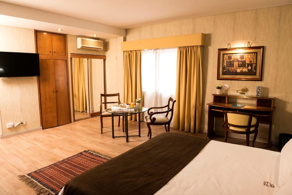 TV and multimedia, Photo of the whole room, Seating area, Bedroom, hair dresser, wardrobe, air conditioner