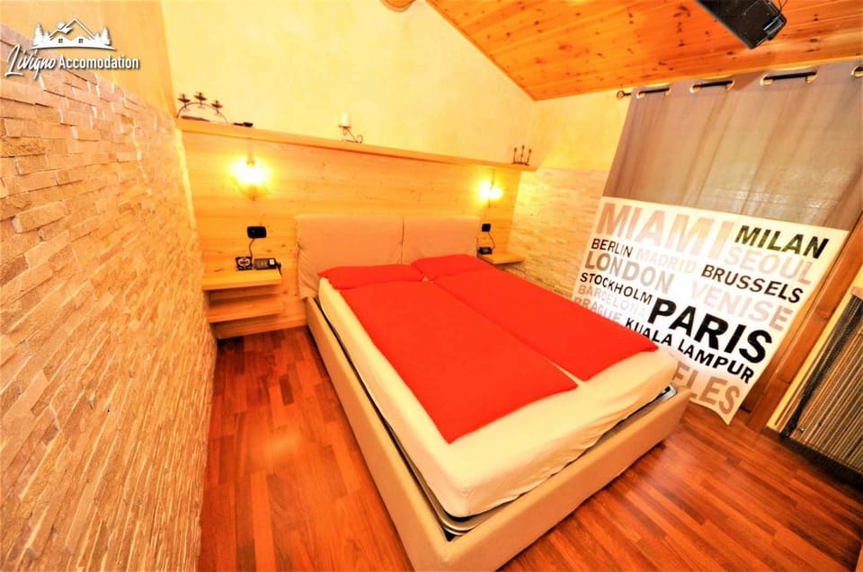 Baita Carosello Apt 6 by Livigno Accomodation Apartment in Canton of Grisons