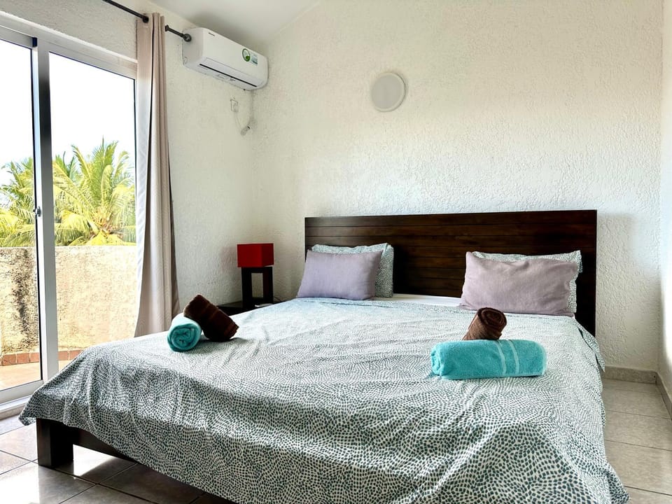 Bed, Photo of the whole room, Bedroom, towels, air conditioner