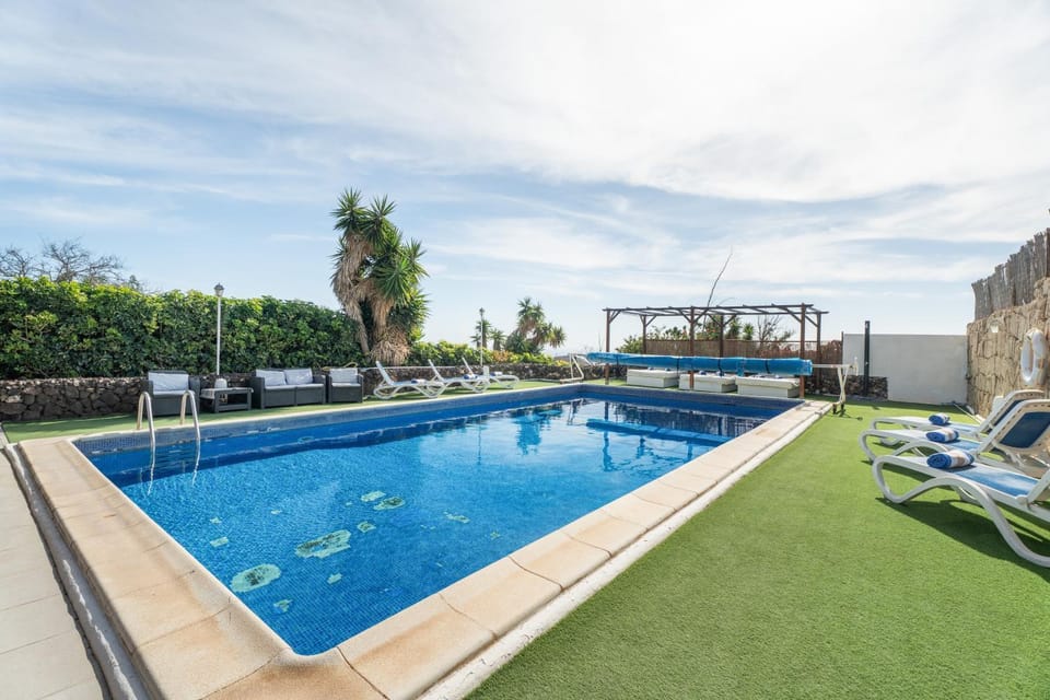 Property building, Living room, Swimming pool