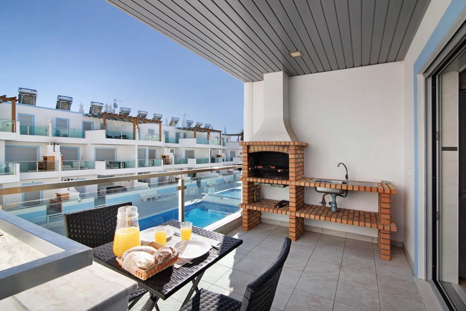 Property building, Living room, Swimming pool