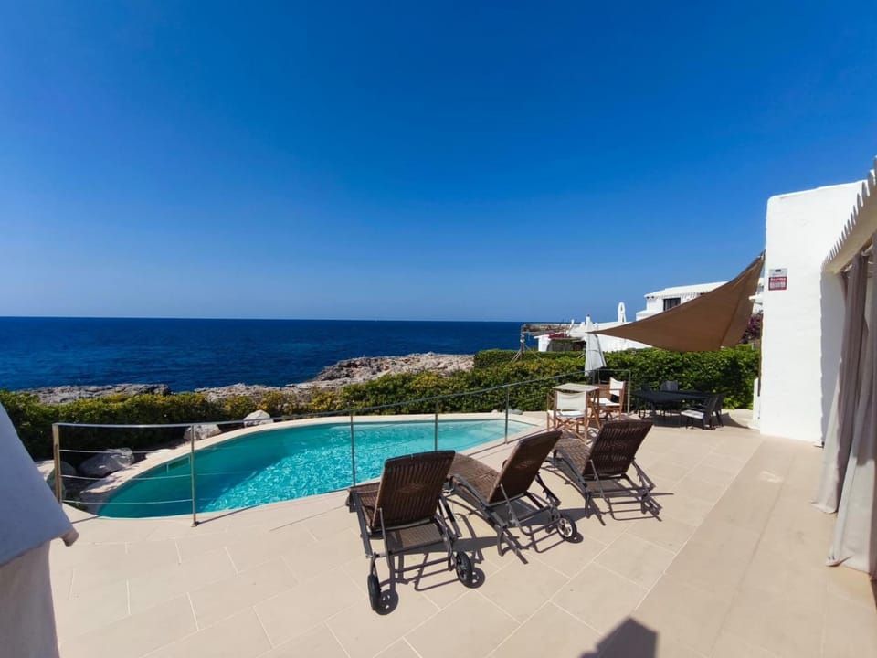 Property building, Living room, Swimming pool
