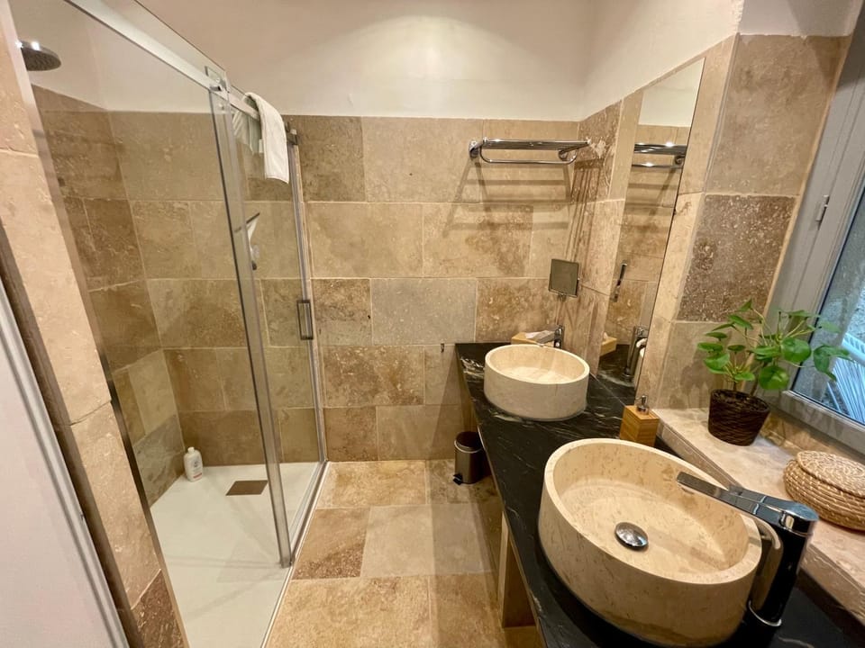 Shower, Toilet, Bathroom, hair dryier, towels