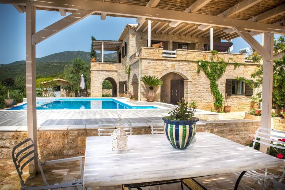 Property building, Patio, Mountain view, Swimming pool