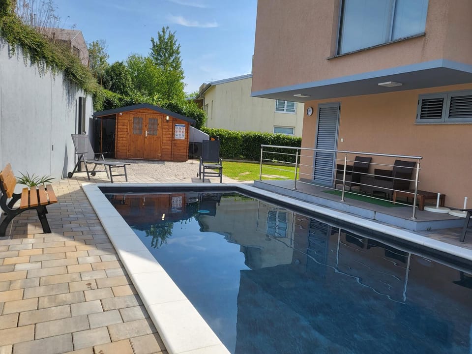 Patio, Pool view, Swimming pool, sunbed