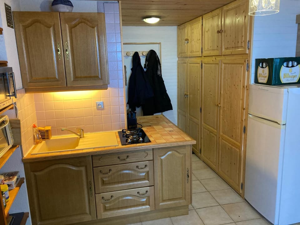 Kitchen or kitchenette, stove
