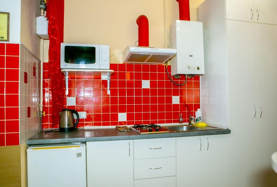 Kitchen or kitchenette, stove