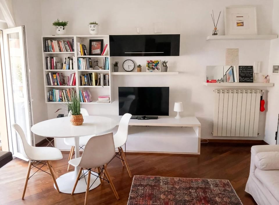 Library, Living room, Seating area, Dining area, Evening entertainment