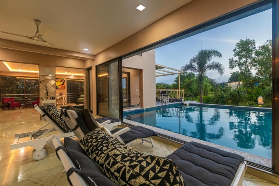 Seating area, Pool view, Swimming pool, fireplace, sunbed