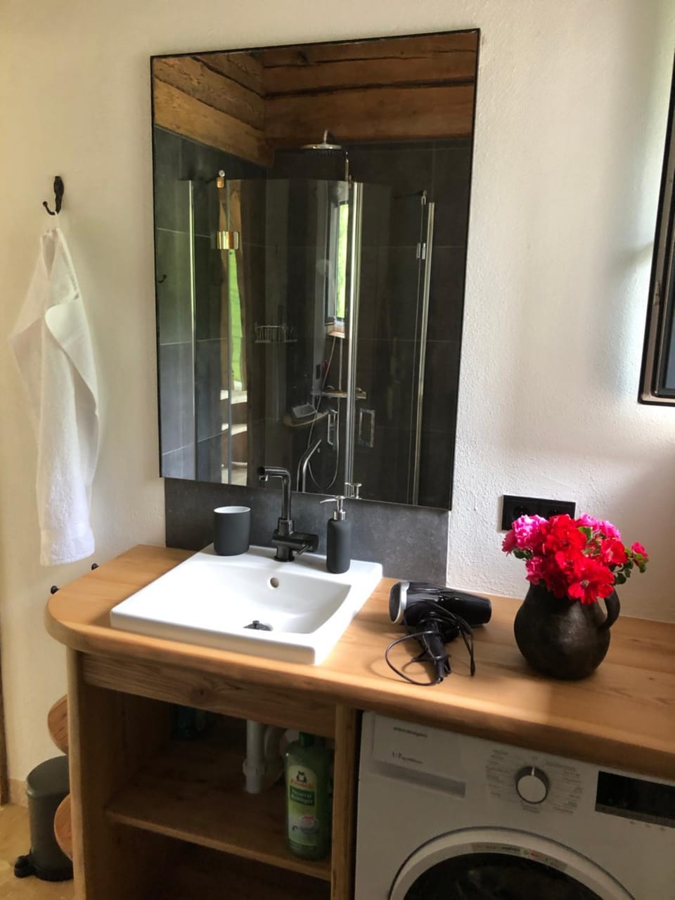 Shower, Bathroom, hair dryier, towels, washing machine
