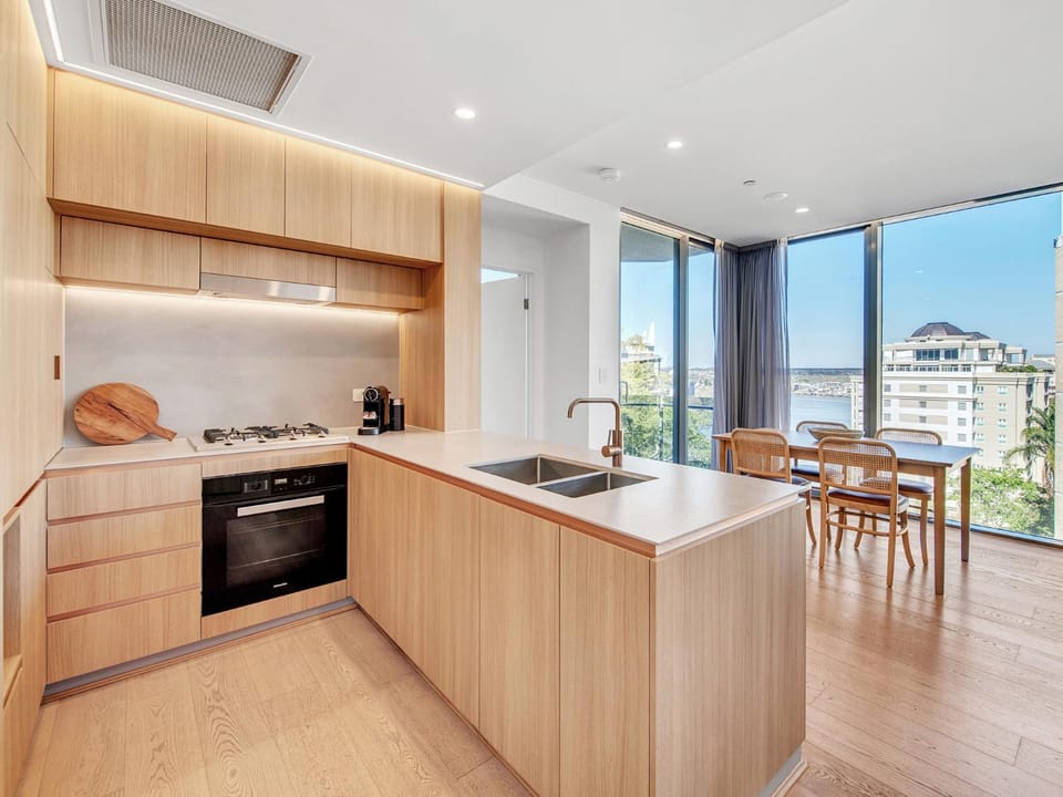 Kitchen or kitchenette, dishwasher, stove, toaster