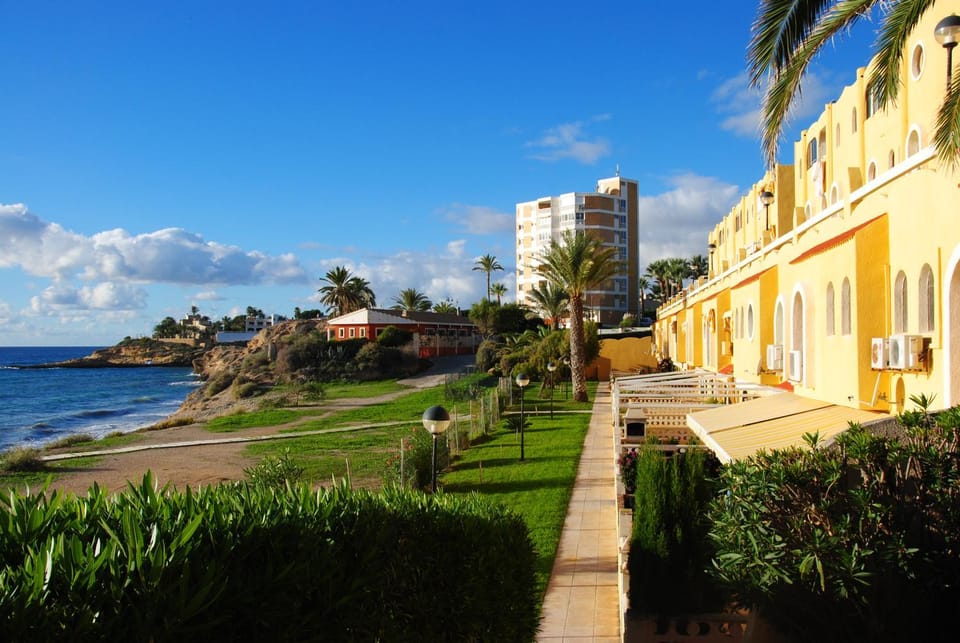 Property building, Day, Natural landscape, Beach, Sea view