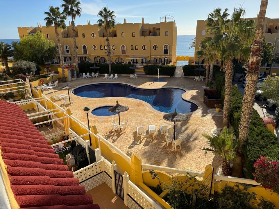 Property building, Day, Natural landscape, Pool view, Sea view, Swimming pool, sunbed
