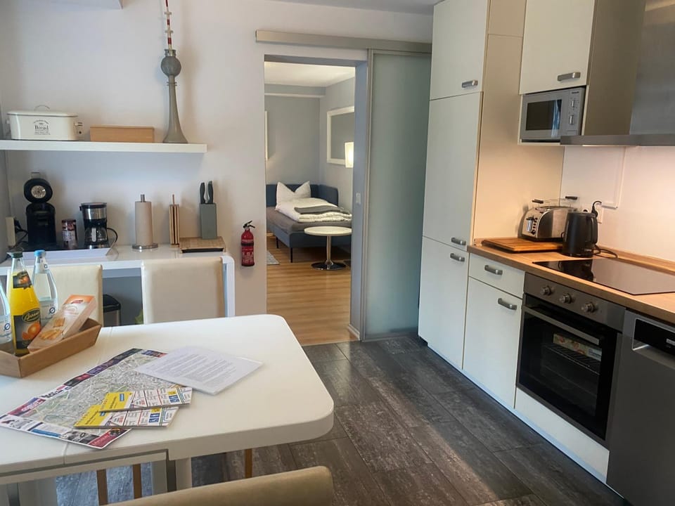 Kitchen or kitchenette, Dining area, dishwasher, oven, stove, toaster