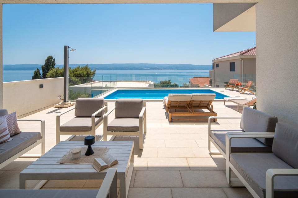 Patio, Day, Natural landscape, View (from property/room), Balcony/Terrace, Living room, Seating area, Pool view, Sea view, Swimming pool, sunbed