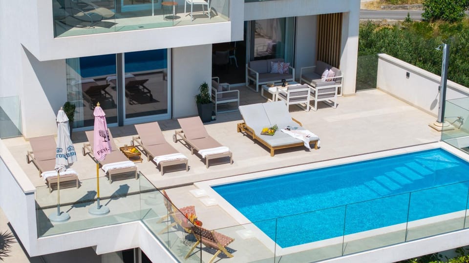 Property building, Patio, Day, View (from property/room), Balcony/Terrace, Seating area, Pool view, Swimming pool, sunbed