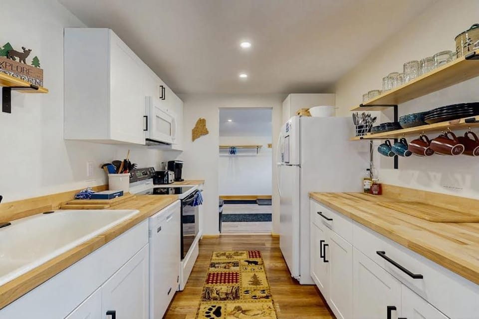 Kitchen or kitchenette, dishwasher, oven, stove, kitchen