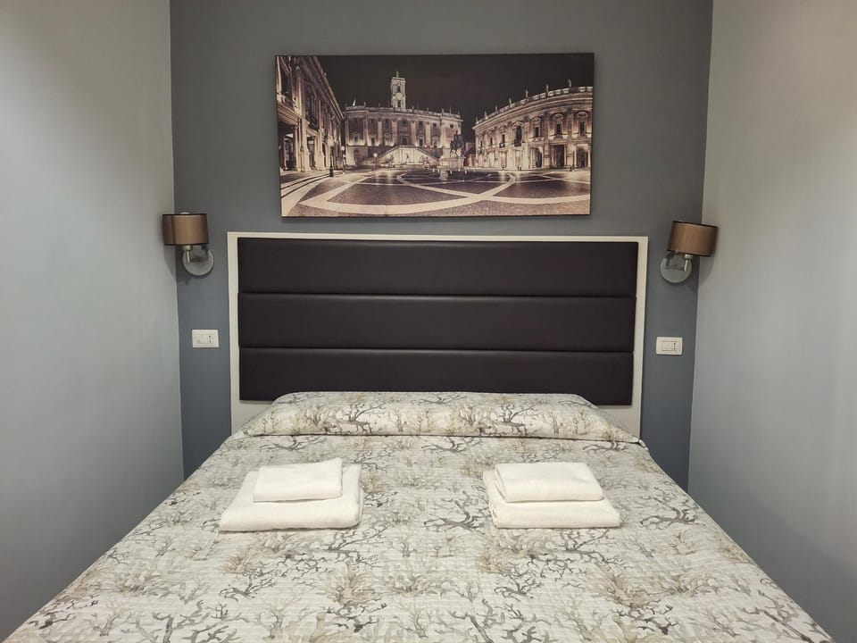 Bed, Property logo or sign, Photo of the whole room, Bedroom, towels