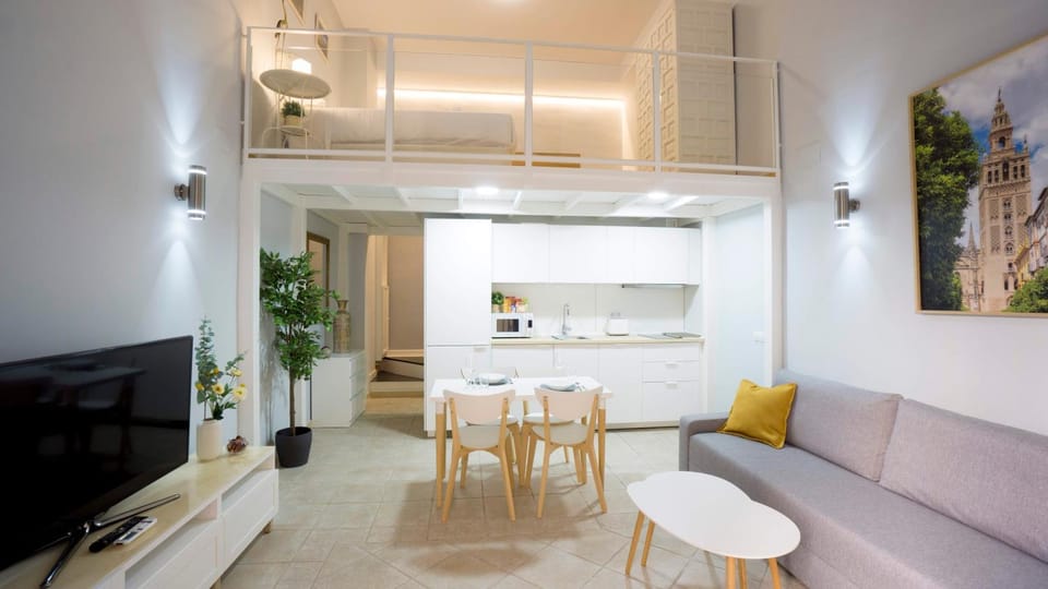 TV and multimedia, Kitchen or kitchenette, Living room, Photo of the whole room, Seating area, Dining area