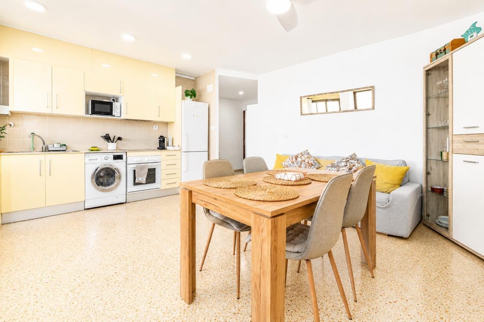 Kitchen or kitchenette, Living room, Dining area, oven, stove, toaster, washing machine