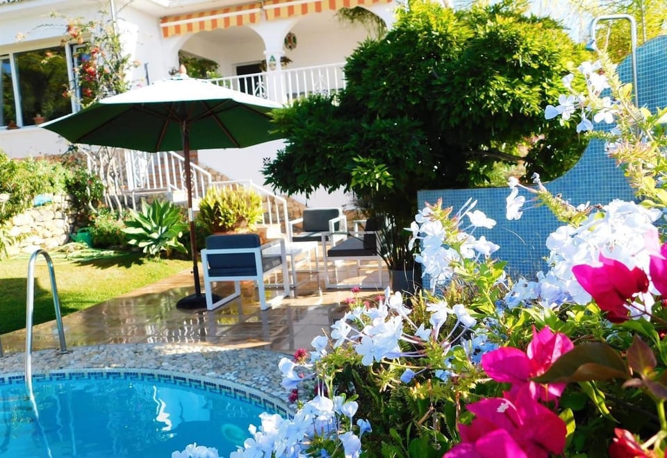 Property building, Living room, Swimming pool