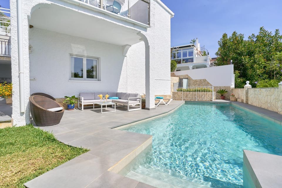 Property building, Living room, Swimming pool