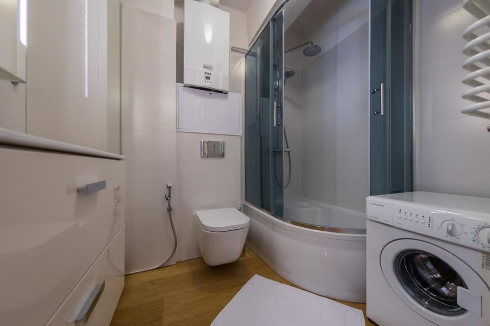 Bathroom, bidet, washing machine
