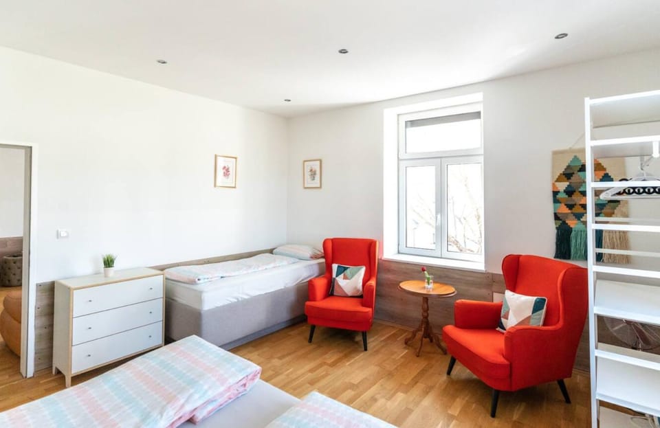 Bed, Seating area, Bedroom