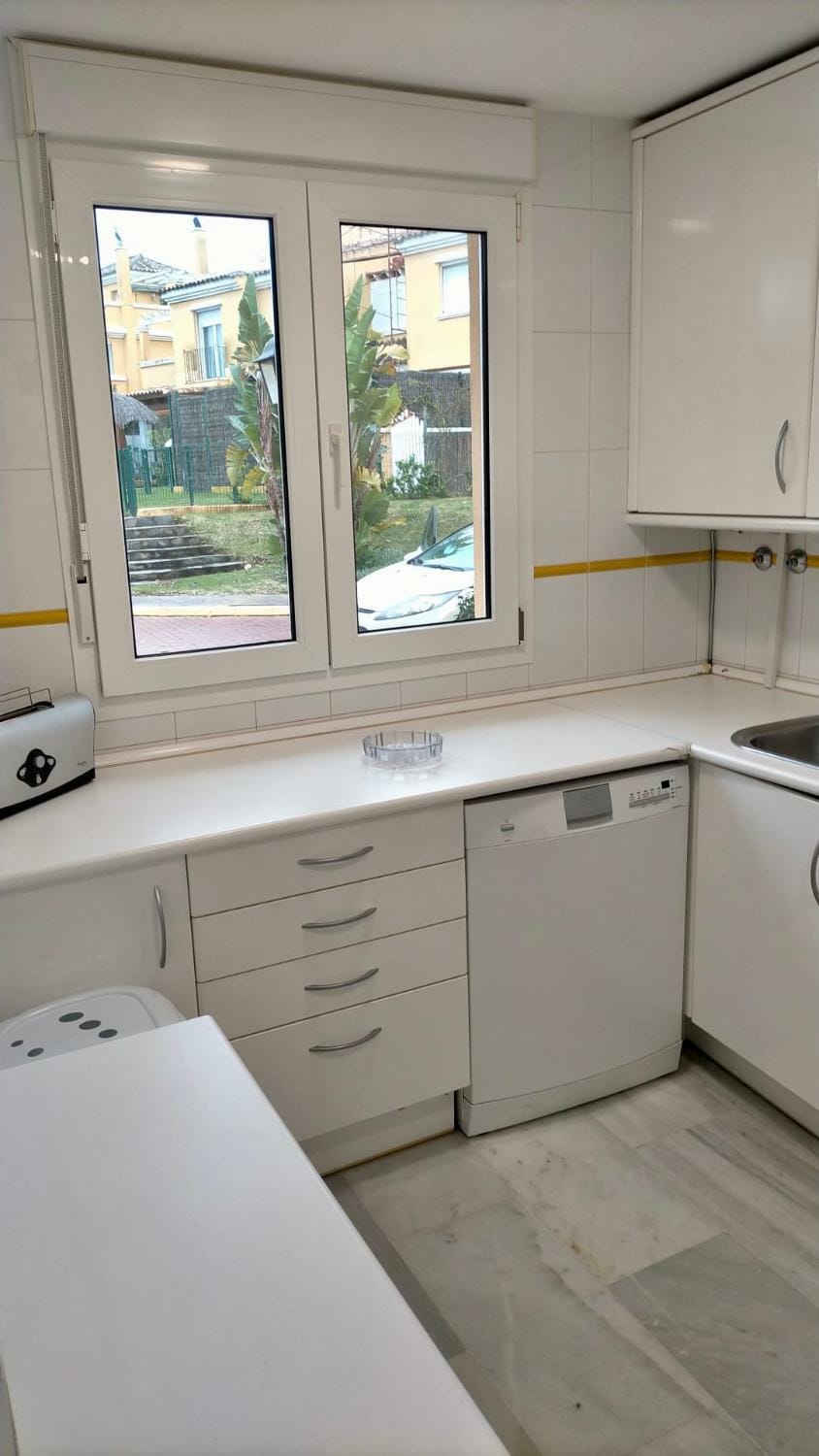 Kitchen or kitchenette, dishwasher, stove