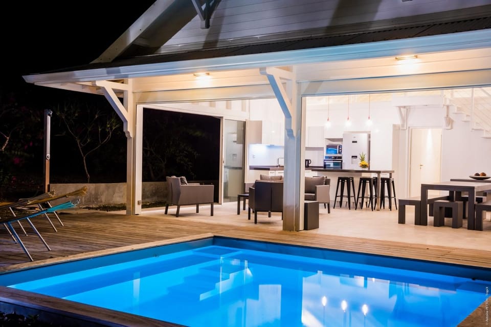 Property building, Living room, Pool view, Swimming pool