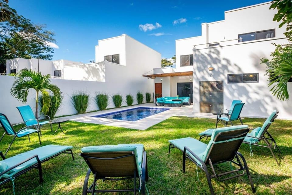 Ultramodern Townhome with an Inviting Coastal Design and Lush Outdoor Oasis with a Private Pool House in Guanacaste Province