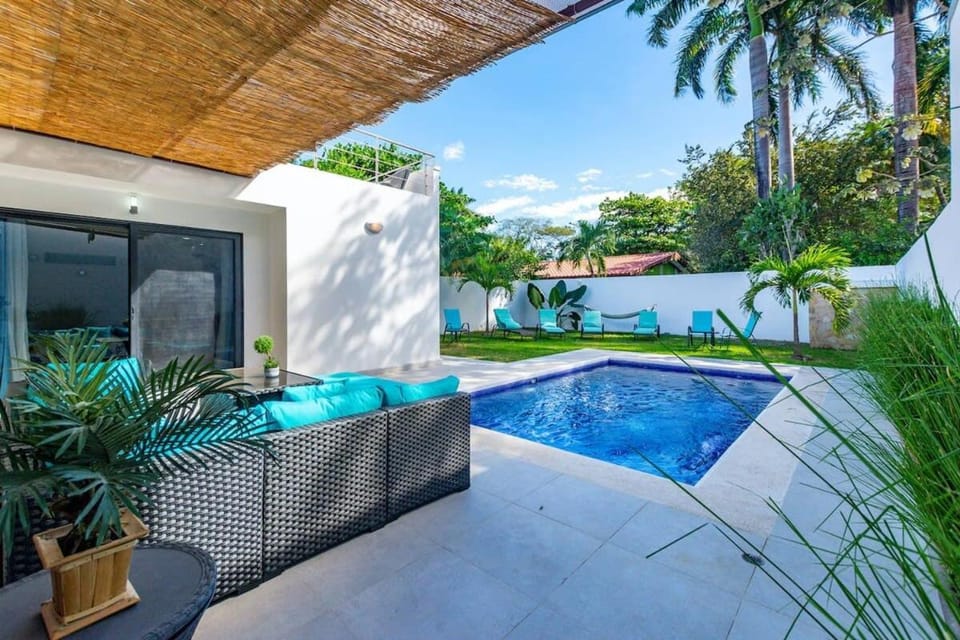 Ultramodern Townhome with an Inviting Coastal Design and Lush Outdoor Oasis with a Private Pool House in Guanacaste Province