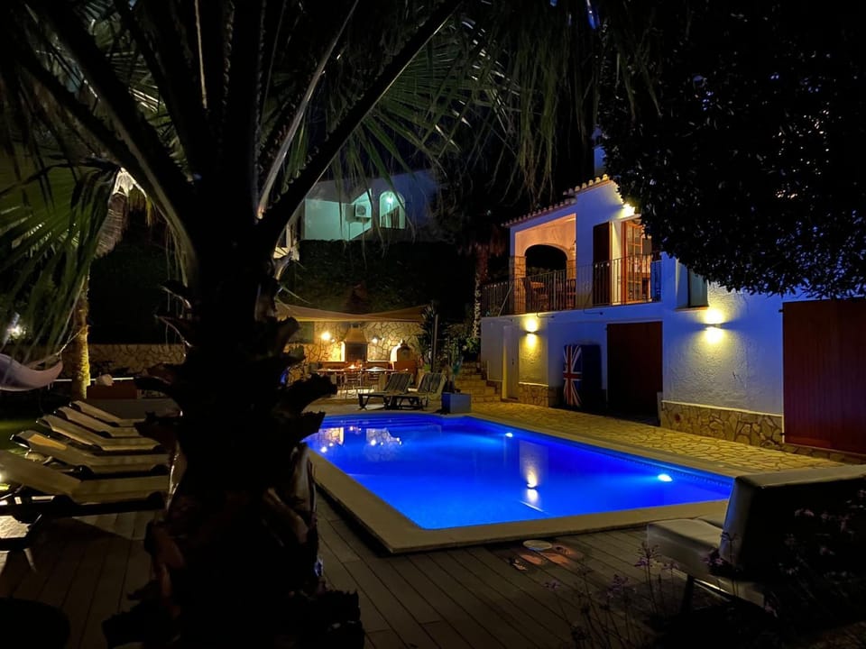 Property building, Living room, Swimming pool