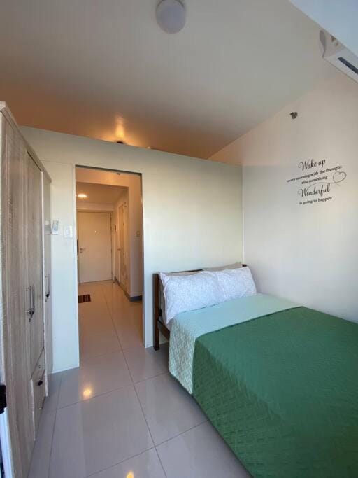 A Cozy 1 Bedroom Unit with a Parking at Tower 2 South Residences SM Southmall Apartment in Las Pinas