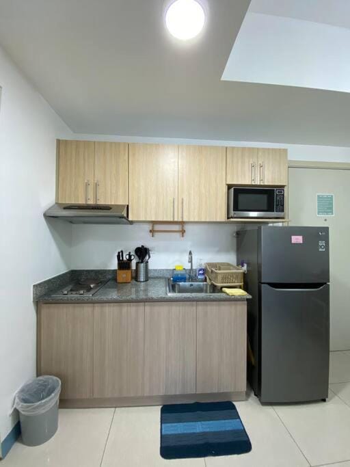 A Cozy 2 Bedroom Unit with a Parking at Tower 2 South Residences SM Southmall Apartment in Las Pinas