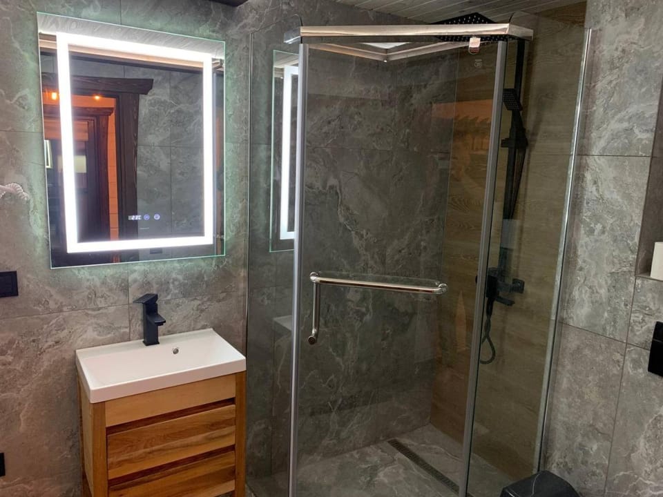 Shower, Toilet, Bathroom, hair dryier, towels, dryer