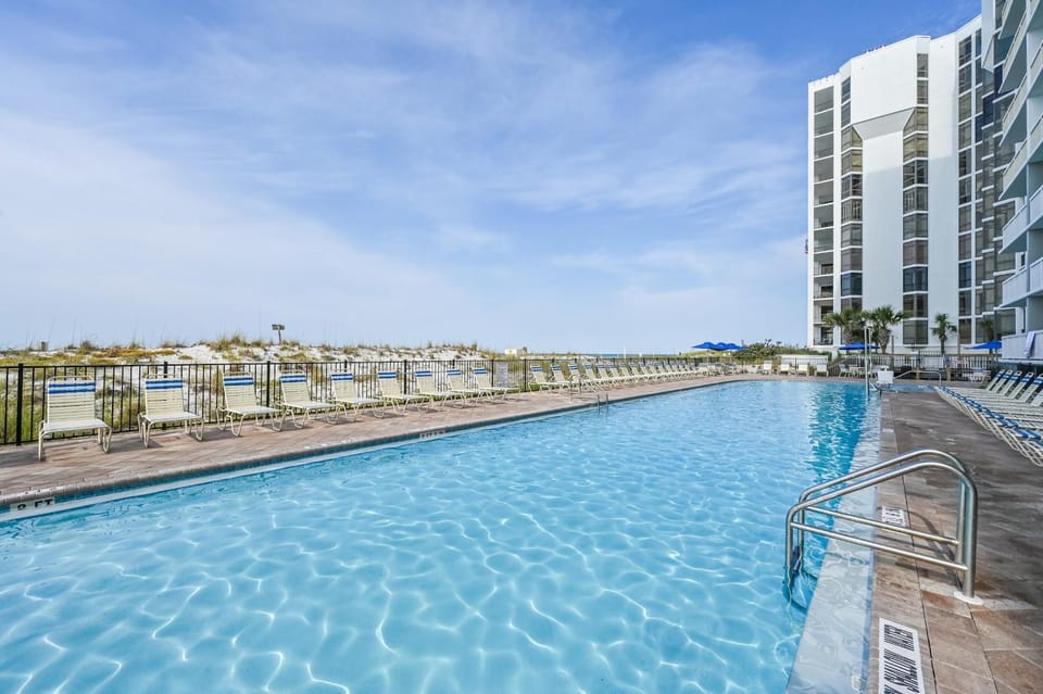 Property building, Natural landscape, Balcony/Terrace, Beach, Pool view, Swimming pool, sunbed