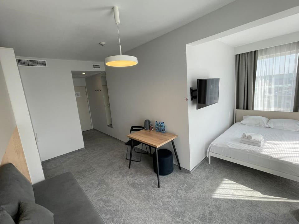 Communal lounge/ TV room, Bed, TV and multimedia, Photo of the whole room, Seating area