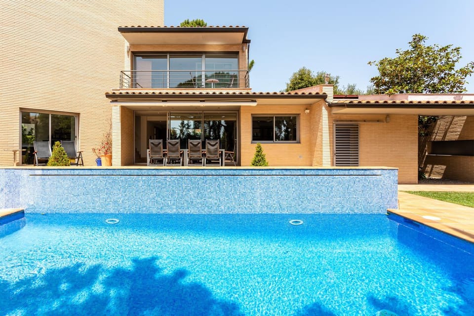 Property building, Living room, Swimming pool