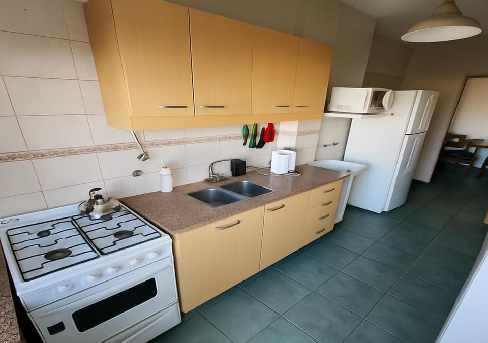 Kitchen or kitchenette, oven, toaster