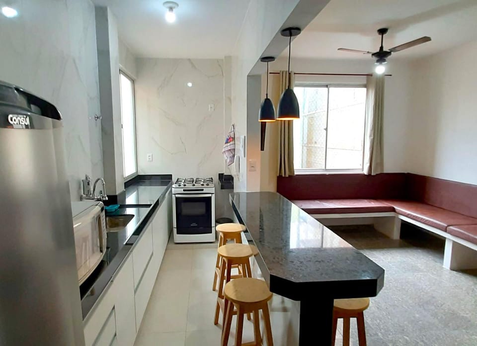 Dining area, fireplace, minibar, stove, kitchen