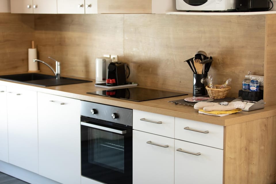 Kitchen or kitchenette, stove, kitchen
