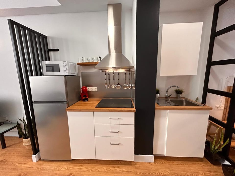 Kitchen or kitchenette, stove