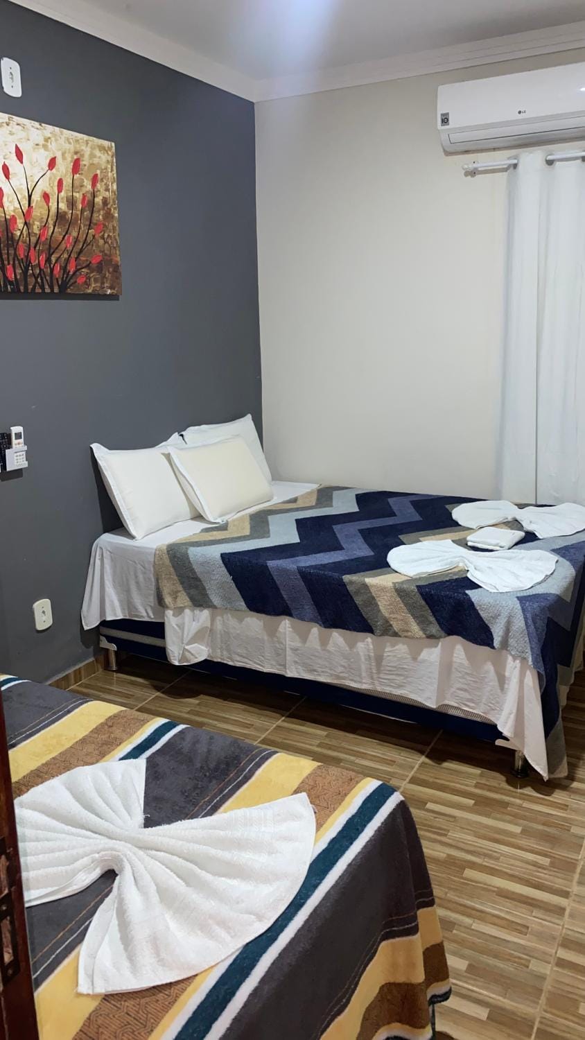 Bed, Photo of the whole room, Bedroom, towels, air conditioner