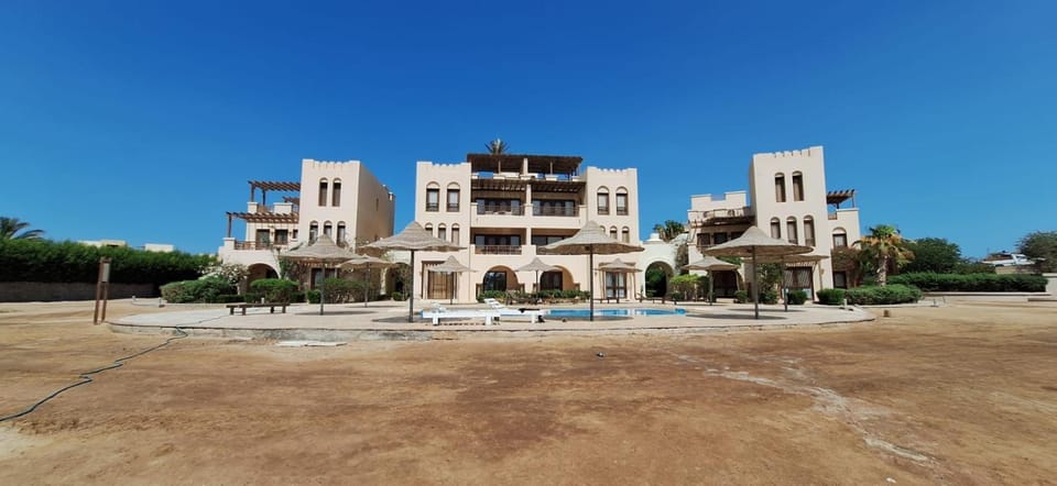 Property building, Day, Landmark view, Pool view, Swimming pool
