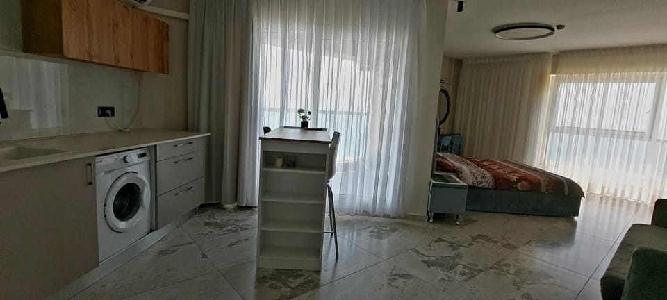 Kitchen or kitchenette, Living room, Seating area, washing machine